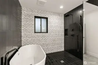 Walk-in shower and slipper tub.