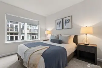 Easily accommodates a queen with side tables.