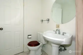 Downstairs full bathroom with shower
