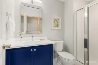 Updated 3/4 bath on the main. Adding this shower was an upgrade when the home was built.