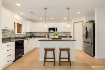 Stainless steel fridge and range.