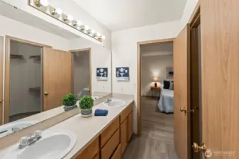 Your primary ensuite features ample storage and a dual vanity.