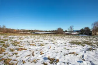 Neighboring .9 acre lot available to purchase with home