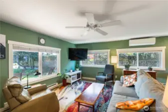 Living room with LVP flooring & double pane windows