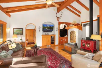 Living/Open Concept, Access to Primary Suite through custom reclaimed wood door