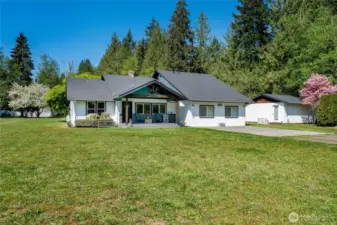 Welcome to the Jim Creek community of Arlington. Views from the covered front porch of Ebey Mountain. This property will check lots of wish list items!