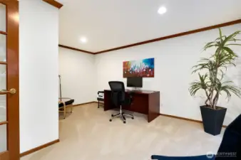 Private main-level office with ideal for remote work, studying, or creative projects. A quiet, dedicated space to focus in comfort and style.