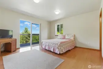 Primary bedroom - more wood floors