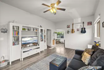 Expansive living space, high ceilings and great amount of natural light make this area live large
