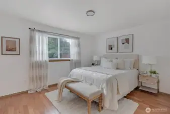 The primary bedroom offers a neutral pallet for your own design.