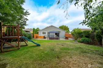 Lots of room to run and play or add some raised garden beds.