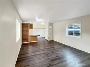 Step inside to discover an open floor plan with laminate flooring.