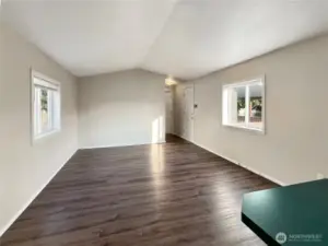 The home boasts vaulted ceilings throughout.