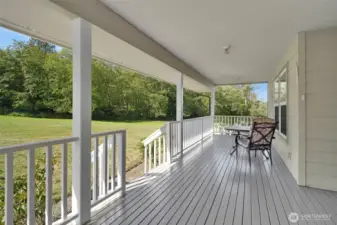 Large freshly painted front porch perfect for sipping a warm beverage in the morning!