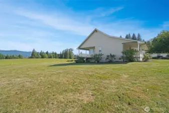 Side of home with mountain views