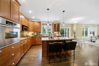 Chef's kitchen comfortably equipped for your meal-prep storage needs, entertaining, and the morning-rush!