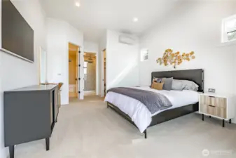 Primary bedroom with en suite bathroom.