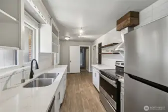 Galley style kitchen on the main. Lots of cabinets and a walk in pantry.
