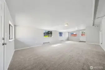 HUGE family room with 2 separate entrances - one from the driveway and another from the backyard.