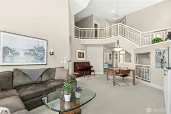 Main Level living area looking up into loft area