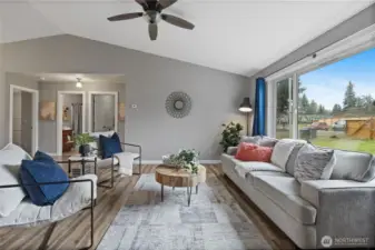 Cozy up in your beautiful living room, with vaulted ceilings