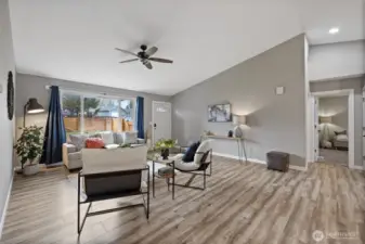 The spacious great room is ready for you and your guests, warm and inviting