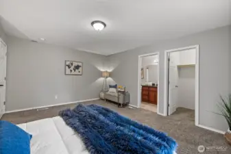 Walk-in closet and attached full bathroom are within your private suite