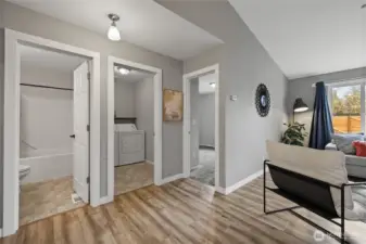 Laundry room is clustered with two bedrooms and a hall full bath - so convenient for cleaning up those messy situations