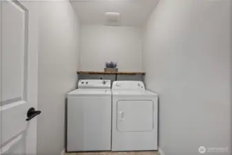 Laundry room, centrally located in the home