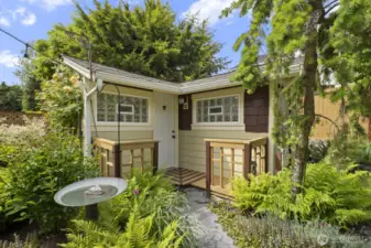 ...with the most awesome garden shed/ she-shed combo...it has both!
