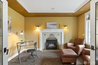 Right inside...the ideal home office w/ fireplace!