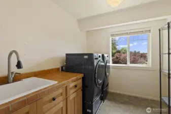 An upstairs laundry...where they should be...where the laundry is!