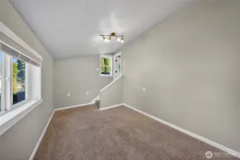 Versatile bonus space ideal for a home office, hobby room, or guest retreat.