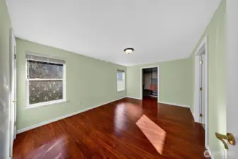 Generous primary suite offering privacy and relaxation.