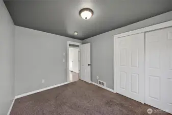 Bedroom 2 with plenty of closet space.