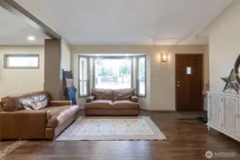 Nice large windows looking out towards foothills and you can also keep an eye on the kids using the playset