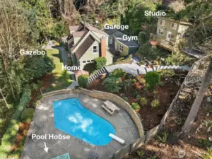 This secluded 1+ acre estate also includes a detached studio, full detached gym, detached 2 car garage and separate parking area for boats/RVs.