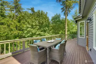 Large deck off the kitchen has gas outlets for your BBQ. Enjoy dining al fresco while you look over the gorgeous backyard.