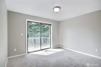 3rd main-floor bedroom has private access to the south-facing, view deck.