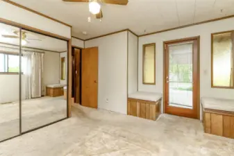 Primary Bedroom with door to back deck