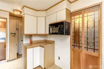Beautiful accent doors separate the spaces between the main floor areas.