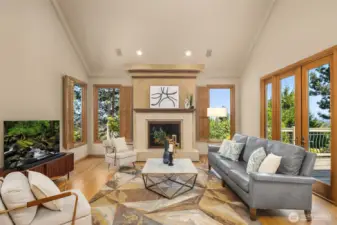 The windows bring in the light and the view, while a wood fire makes this space so cozy in the winter months.