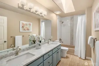 the refreshed family bathroom is shared between just two bedrooms.