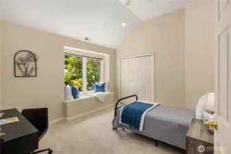 Adorable additional bedroom with built in bench. Staged with a twin but room for larger.