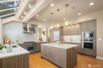 The remodeled kitchen is the heart of the home, carefully designed for everyday cooking, as well as a social gathering space, while also taking full advantage of the views of the Cascade Mountain range