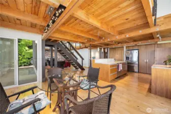 Dining area with access to the deck and patio.