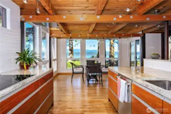 Kitchen with the dining area.  Note the beautiful granite topped built ins.
