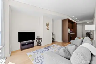 TV can be placed on either wall opposite of each other with cord hider on each wall.