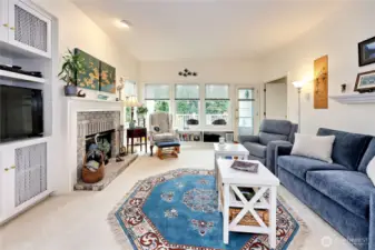 Looking toward the door to the deck and the primary bedroom to the right