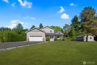 Gorgeous, well-kept lawn and privacy all-around!